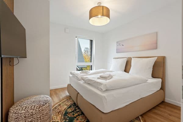 Suite 4 mit Balkon und moderner Einrichtung