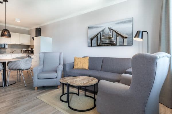 Deluxe-Apartment 2.12 mit eigener e-Ladesäule in der Tiefgarage und XL-Strandkorb am Strand